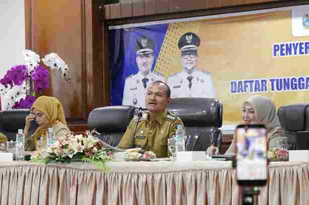 Wali Kota Tanjungbalai Serahkan Secara Simbolis SPPT PBB-P2 dan Tagihan PKB