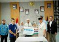 Bupati Batu Bara Serahkan Bantuan kepada Keluarga Korban Kebakaran PT EVYAP
