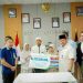 Bupati Batu Bara Serahkan Bantuan kepada Keluarga Korban Kebakaran PT EVYAP