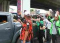 Jumat Berkah, Bid Humas Polda Sumut Berbagi Kasih dengan Sopir, Pengemudi Becak Motor dan Ojol